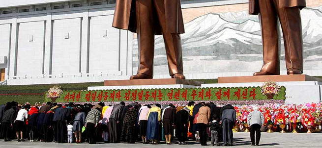 the-statues-of-kim-il-sung-and-kim-jong-il-on-mansu-hill-in-pyongyang-april-2012